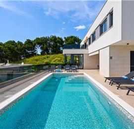 5 bedroom beachfront villa with heated pool near Omis, sleeps 9